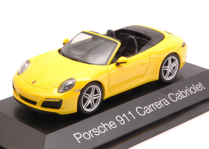 MODELLINO SCALA COMPATIBILE CON PORSCHE 911 CARRERA CABRIOLET 2016 YELLOW 1:43 HERPA HP7102