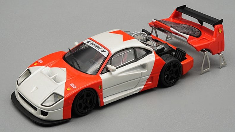 MODELLINO IN SCALA COMPATIBILE CON FERRARI F40 LM 1996 PRESS VERS.MARLB./SILVER WHEELS W/ENGINE DETAIL 1:64 TECNOMODEL TMD6401C