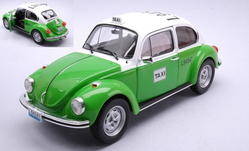 MODELLINO IN SCALA COMPATIBILE CON VW BEETLE 1300 MEXICAN TAXI 1974 GREEN 1:18 SOLIDO SL1800521