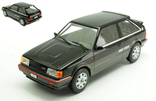 MODELLINO SCALA COMPATIBILE CON MAZDA 323 4WD TURBO BLACK/MET.DARK GREY 1:24 WHITEBOX WB124222