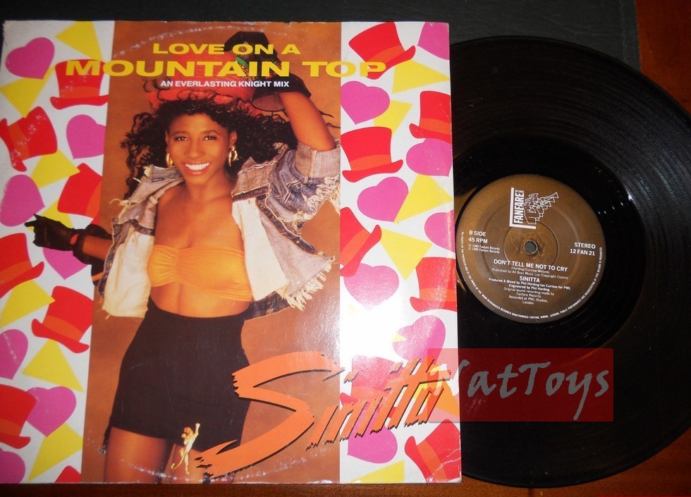 12" 33 TR/MIN Sinitta L'AMOUR AU SOMMET D'UNE MONTAGNE/NE ME DITES PAS DE NE PAS CRY 1989 VG/VG