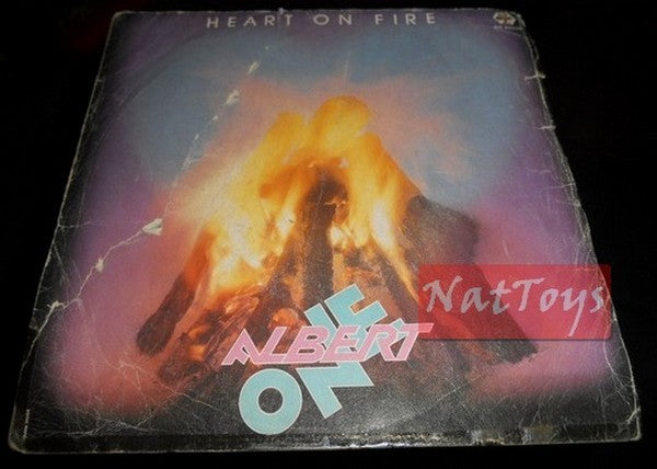 7" 45 RPM Albert One HEART ON FIRE/HEART ON FIRE (instrumental) 1985 - G/VG