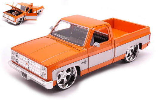 MODELLINO IN SCALA COMPATIBILE CON CHEVROLET C-10 PICK UP 1985 ORANGE/GREY 1:24 JADA TOYS JADA33612