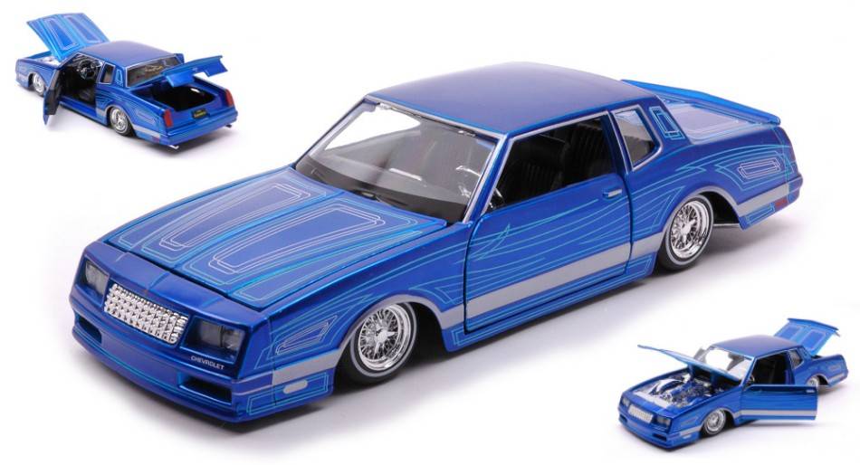 MODELLINO IN SCALA COMPATIBILE CON CHEVROLET MONTE CARLO LOWRIDER 1986 BLUE 1:24 MAISTO MI32542